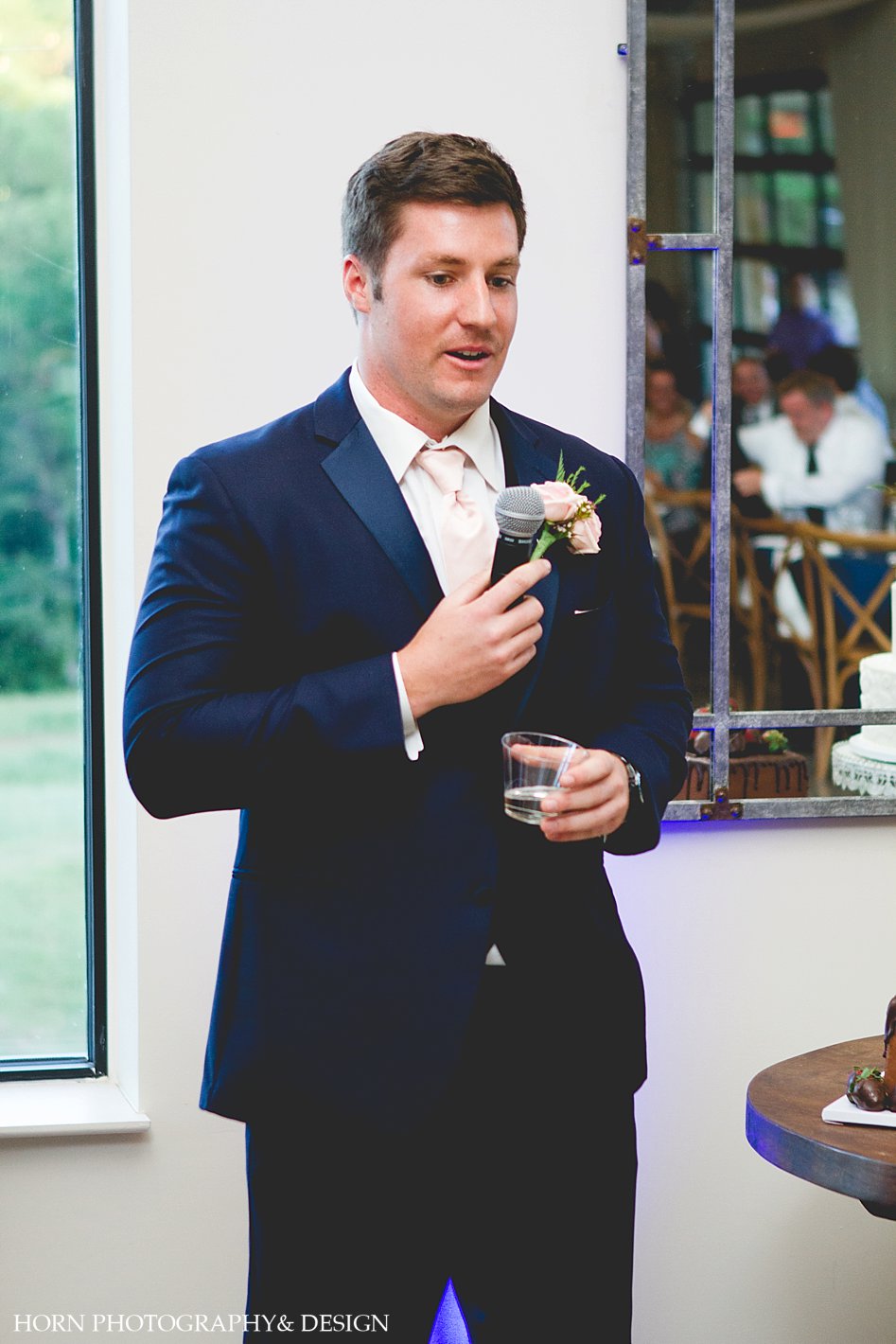 Best man giving toast at wedding 