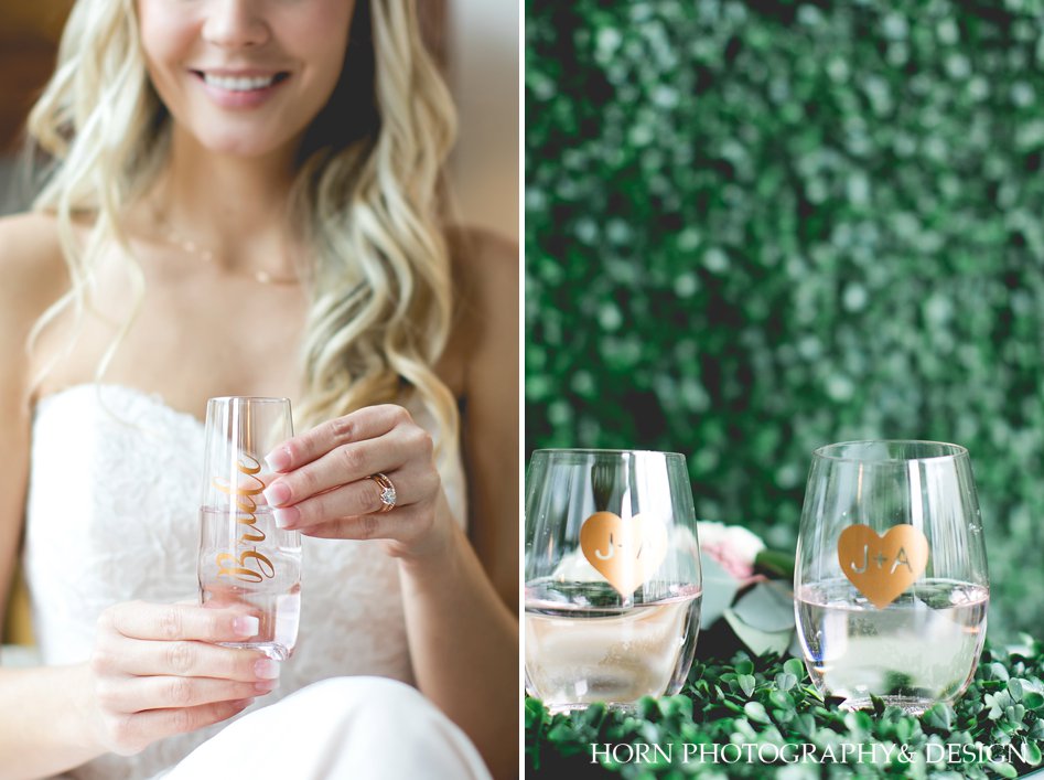 Bride holding champagne glass styled 