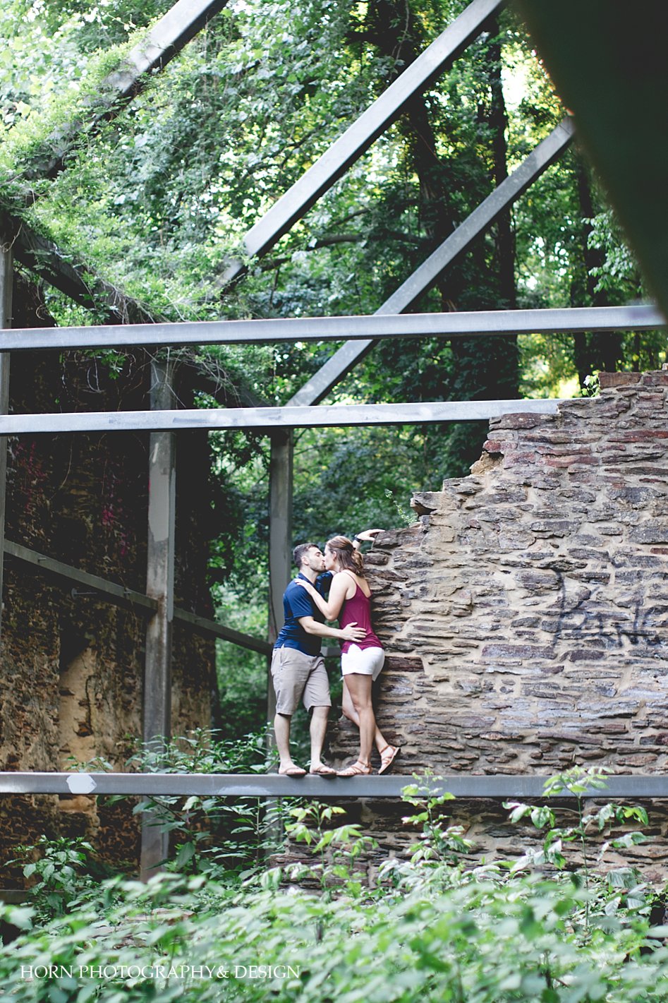 Atlanta Engaged shoot with couple kissing in historic ruins