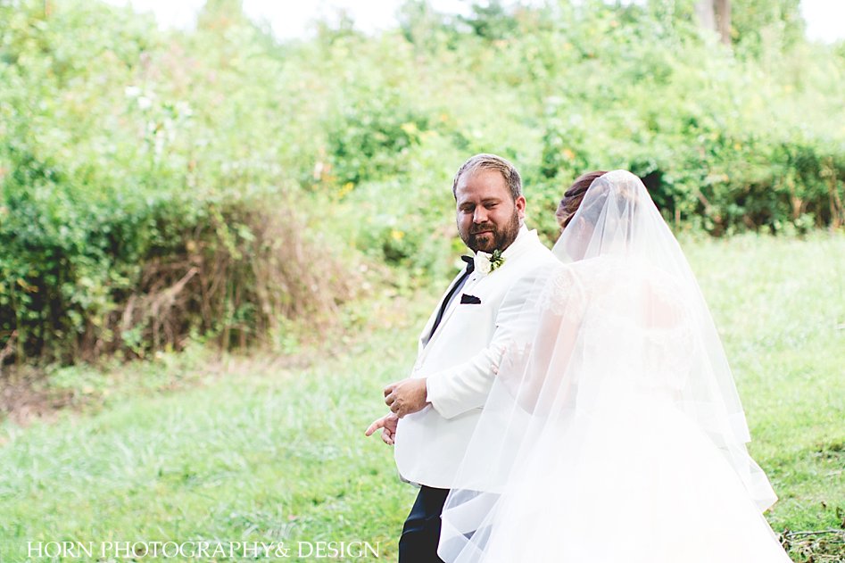 bright airy photography of bride meeting groom for first time