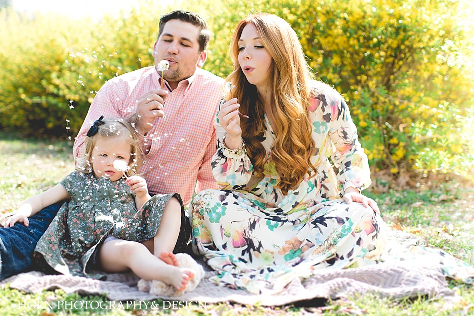 family portraits family blows dandelions