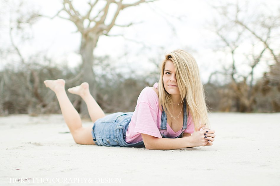Driftwood Beach Senior Shoot girl on sand Horn Photography and Design Dahlonega GA
