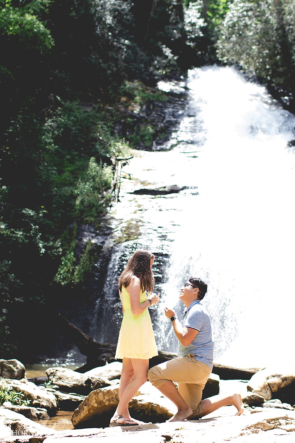 surprise proposal waterfall epic beauty