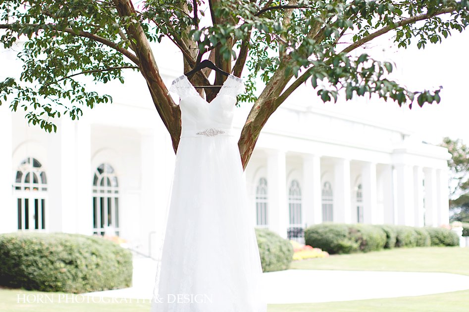 wedding dress in front of Hilton Marietta by Horn Photography and Design