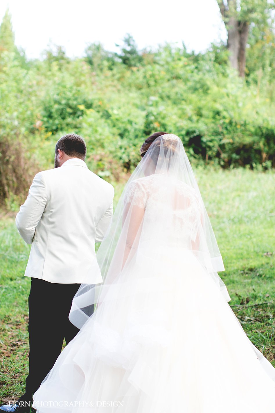 first look before wedding in montaluce winery & vineyard by horn photography and design