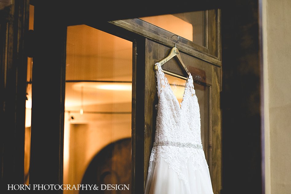 Wedding dress hanging from Montaluce Winery Door