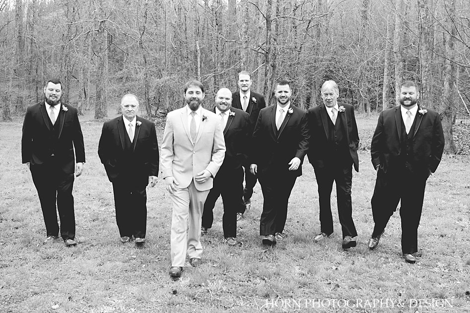 groom with groomsmen black and white