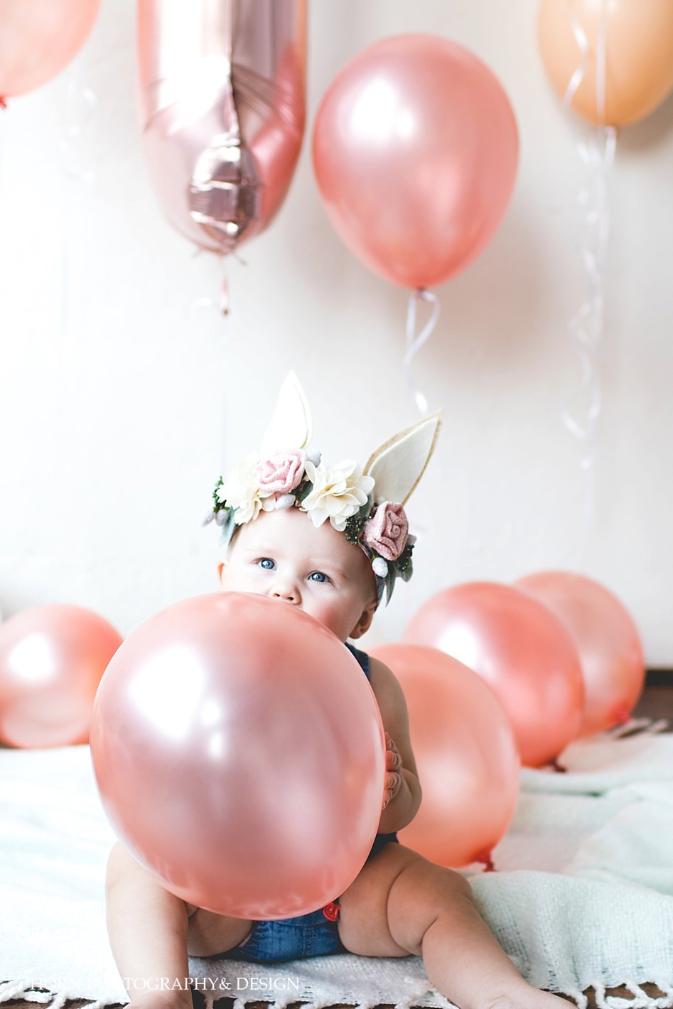 adorable little child with balloon birthday shoot horn photography and design Dahlonega GA photographer