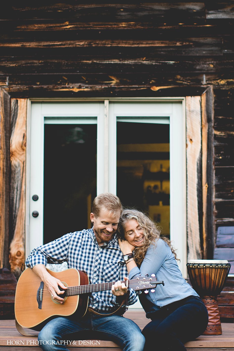 tone of our voice husband and wife sit on porch guy plays guitar