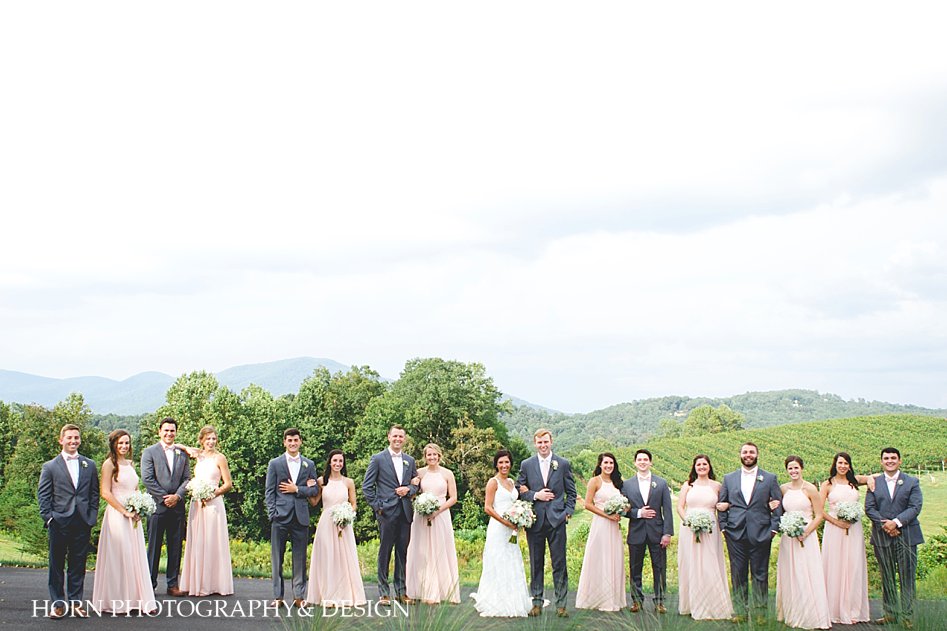 Kaya Vineyard & Winery Wedding bridal party overlooking mountains
