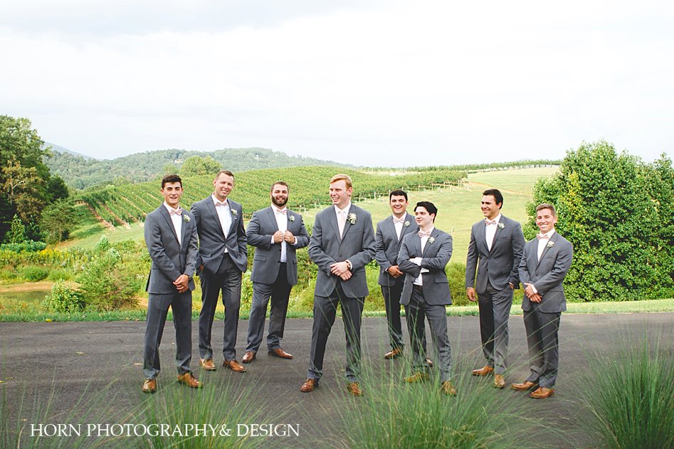 groomsmen in gray suits Kaya Vineyard & Winery Wedding