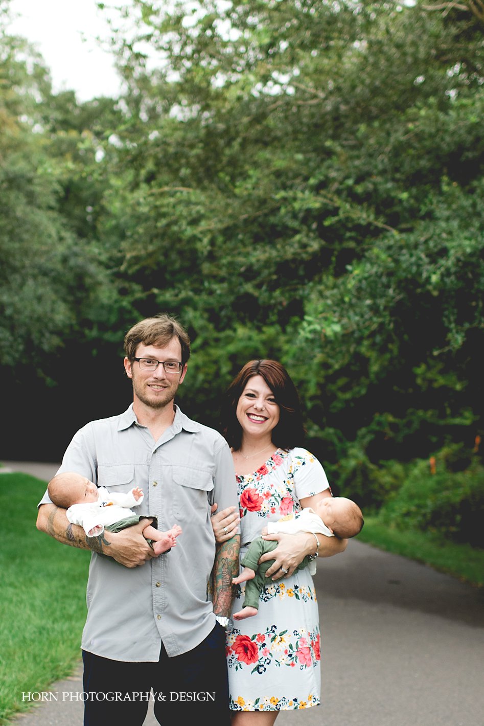 family shoot husband and wife hold twins