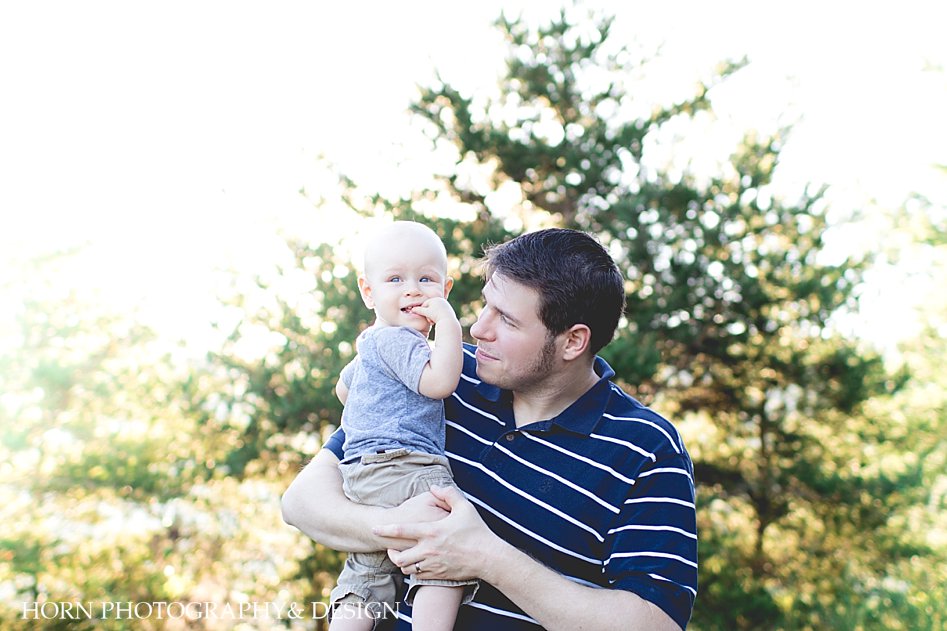 Dahlonega Family Shoot Horn photography and design father holds son in arms