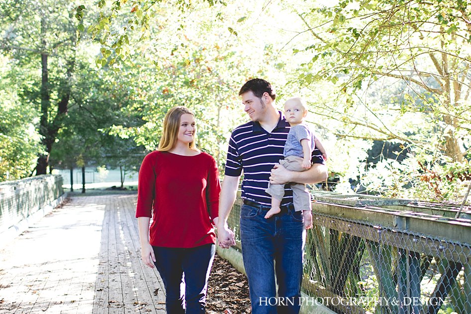 parents holding son Dahlonega Family Shoot Horn photography and design