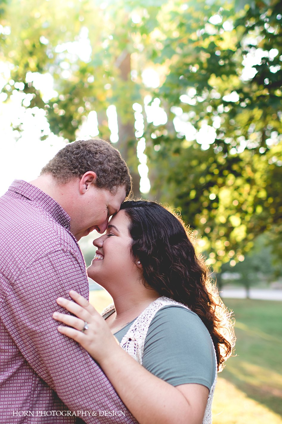 couple holds one another during anniversary shoot