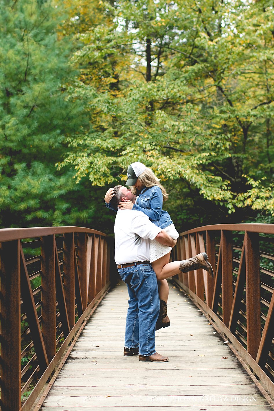 North Carolina Fall Engagement Horn photography and design couple on bridge