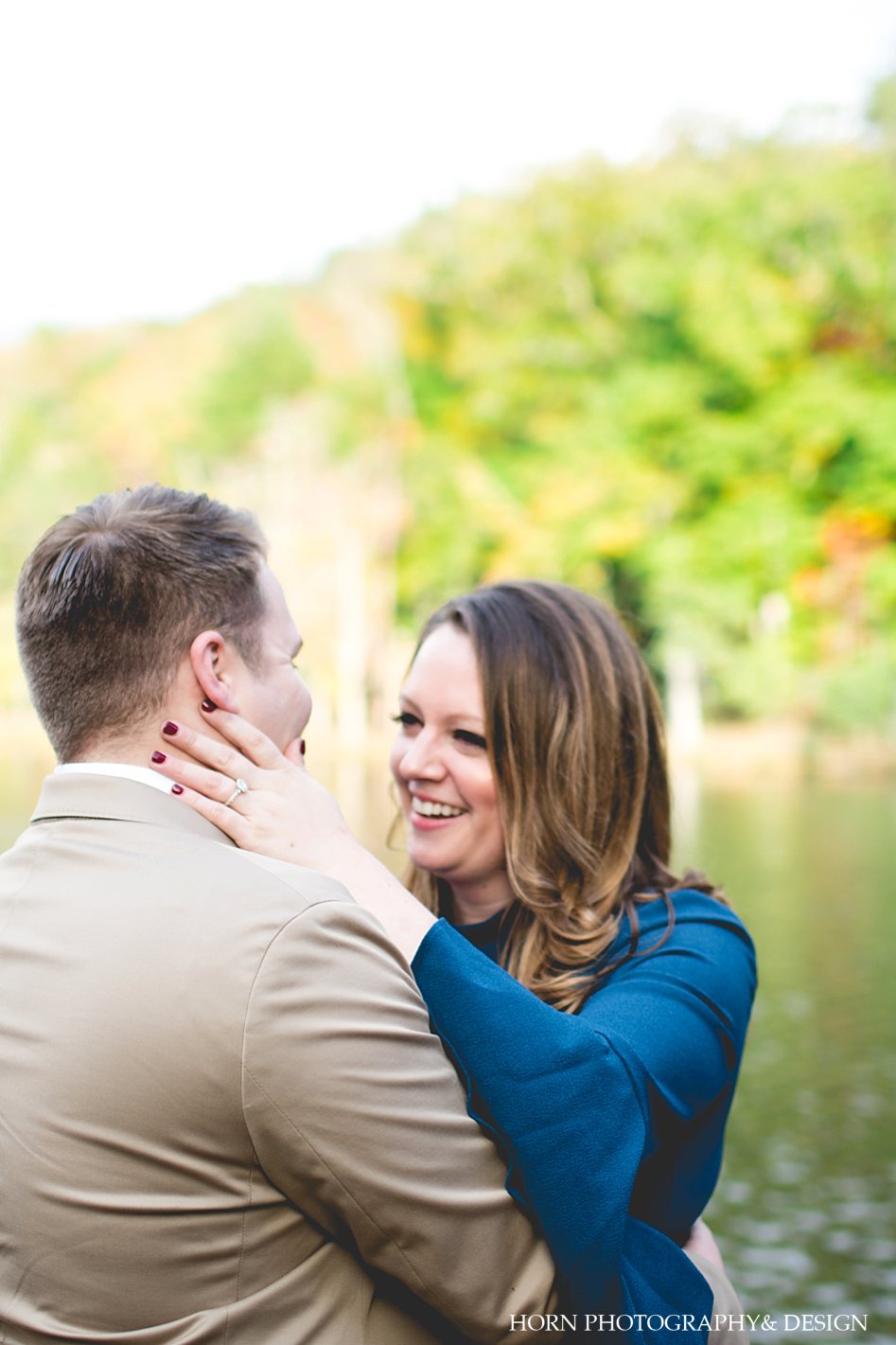 couple laughs North Georgia Fall Engagement Horn photography and design Dahlonega photographer