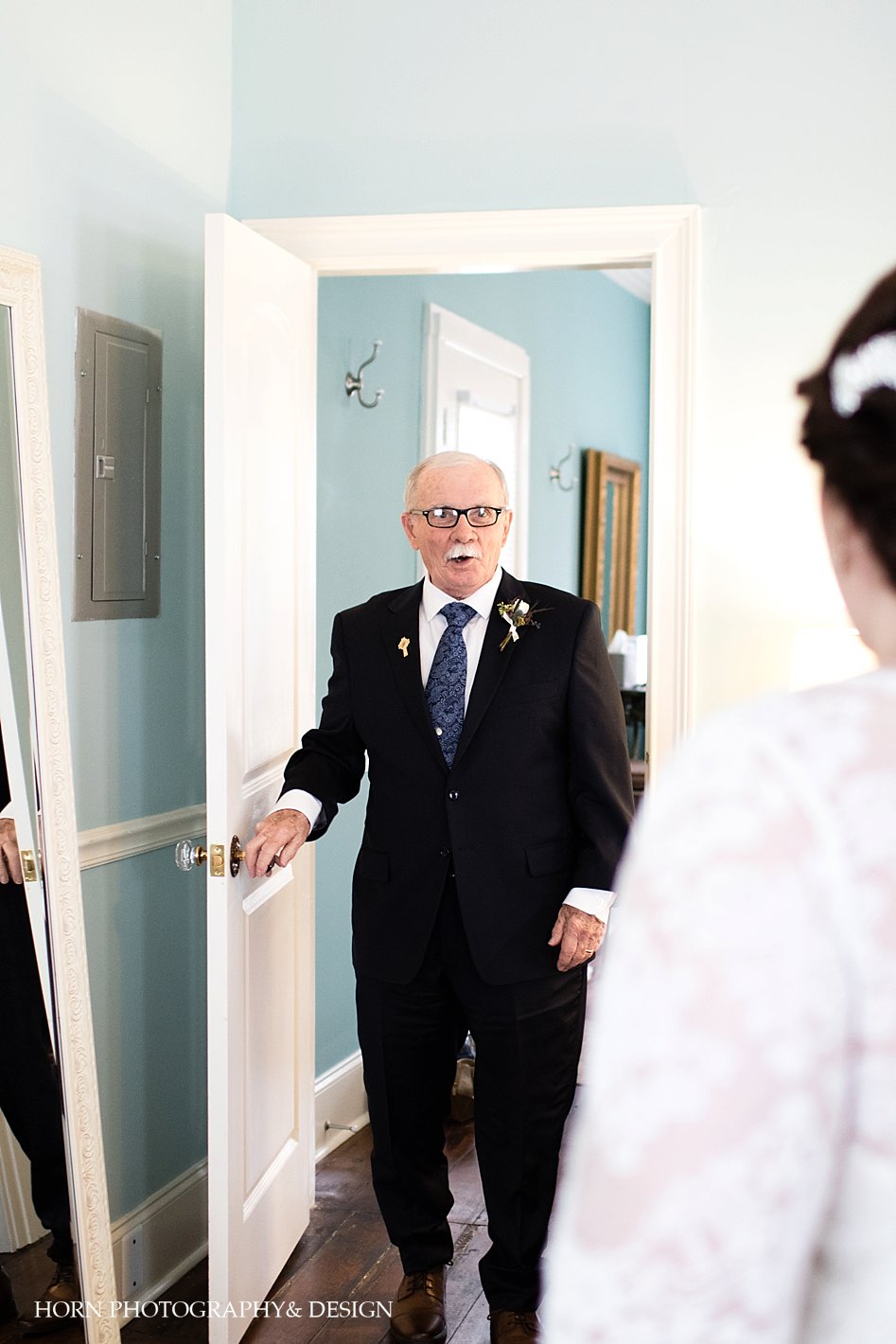 dad's reaction during his first look of his daughter in her wedding dress