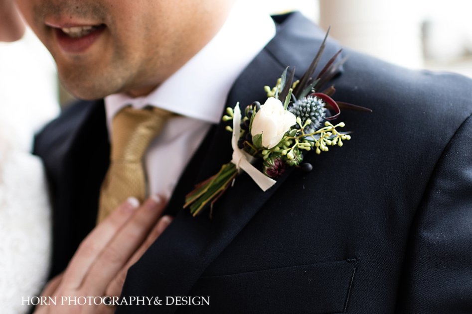 What's Included Groom with boutonnière Horn photography and design business branding