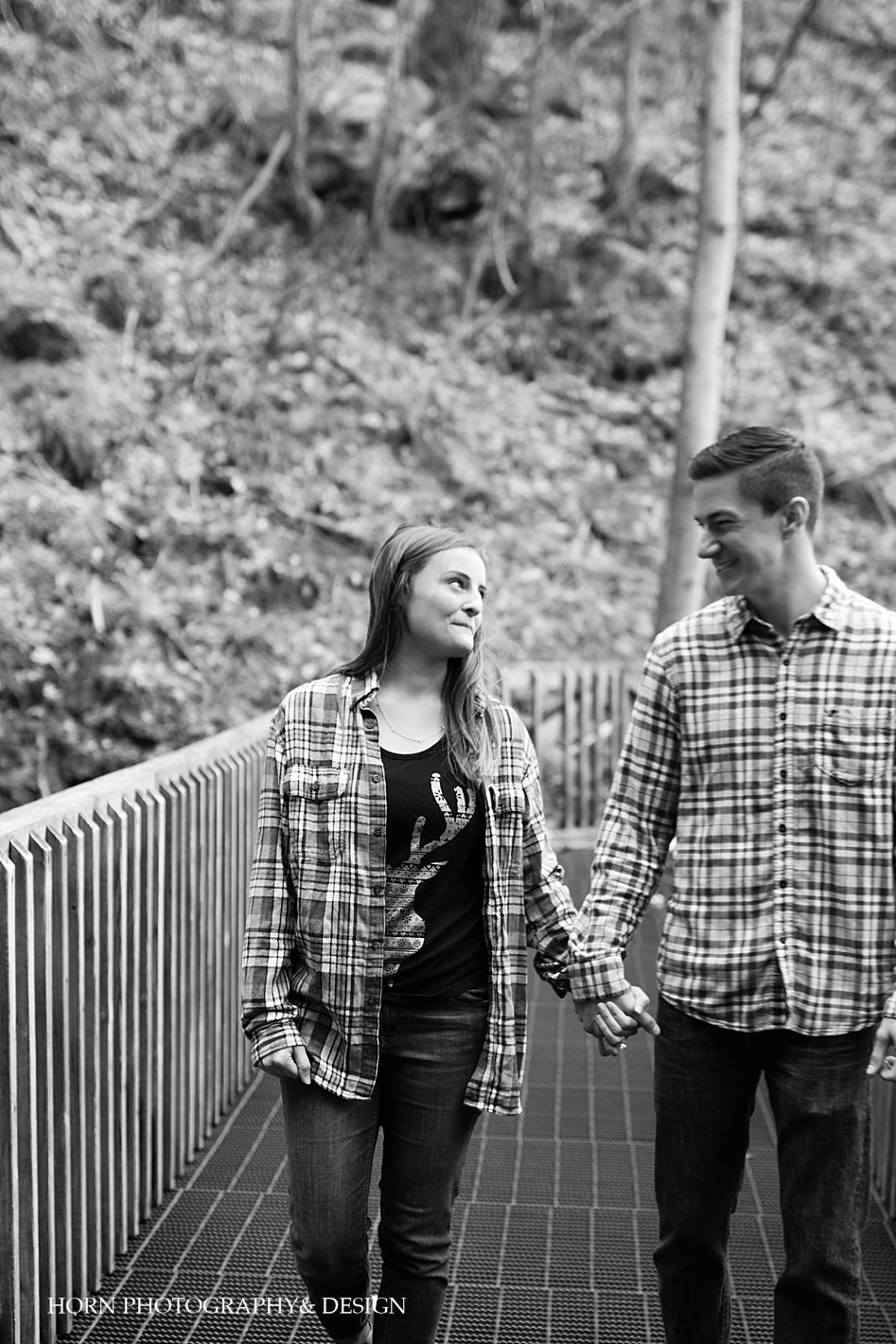  black and white couple holding hands Surprise Proposal at Amicalola Falls horn photography and design Dahlonega Georgia photographers 