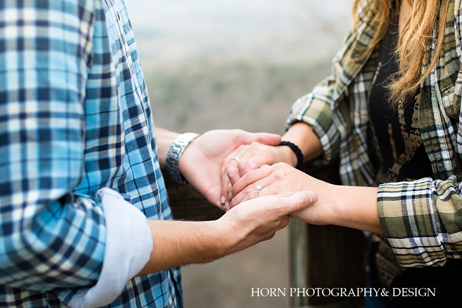 Surprise Proposal at Amicalola Falls holding hands