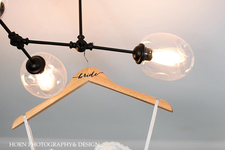 Bride hanger with vintage bulbs Horn photography and design Dahlonega Ga Juliette chapel wedding