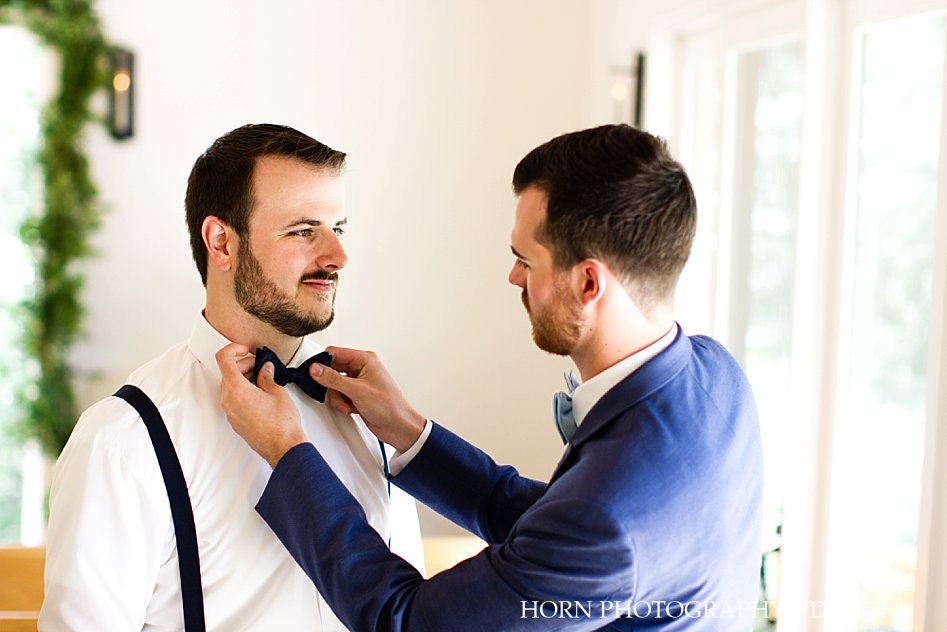 groom getting ready with groomsmen