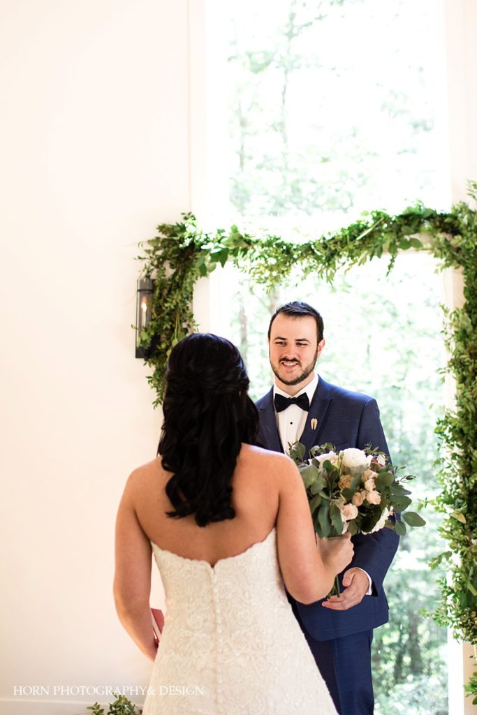 bride's first look groom with greenery Juliette chapel wedding Atlanta wedding photographer 