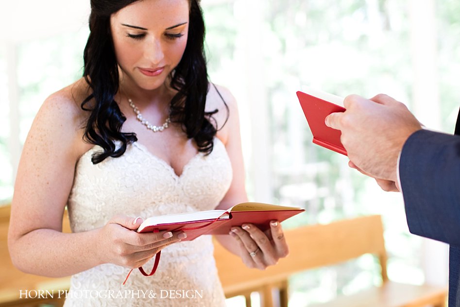 bride reads her vows book wedding love letters 