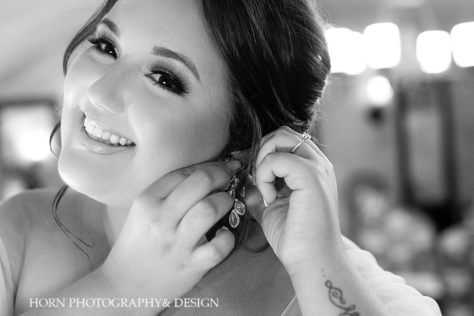 black and white bride get ready photo bride with tattoo natural make up bride jewelry horn photography and design