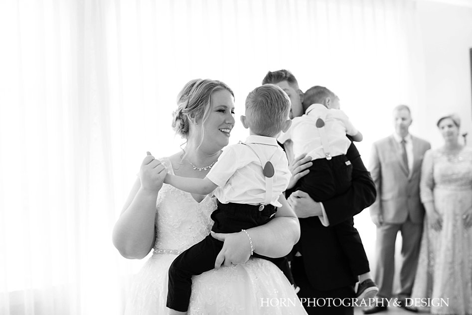 black and white bride groom and kids first dance mother and father of the bride look on photo idea horn photography and design