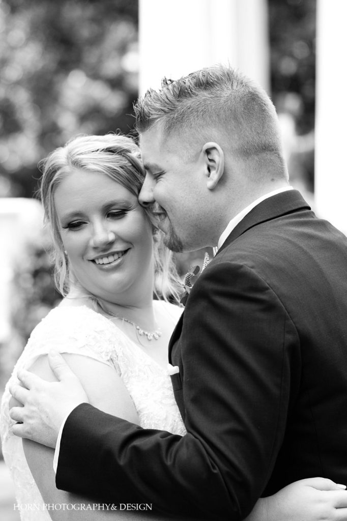 black and white candid wedding photo poses diamond drop necklace lace wedding gown bridal loose updo Atlanta Estate wedding Georgia horn photography and design