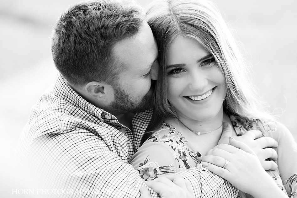 black and white engagement photo embrace pose Metro Atlanta husband and wife team horn photography and design
