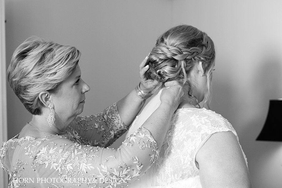 black and white get ready final touches mother of the bride loose braided bridal updo veil final touch photo Atlanta GA horn photography and design