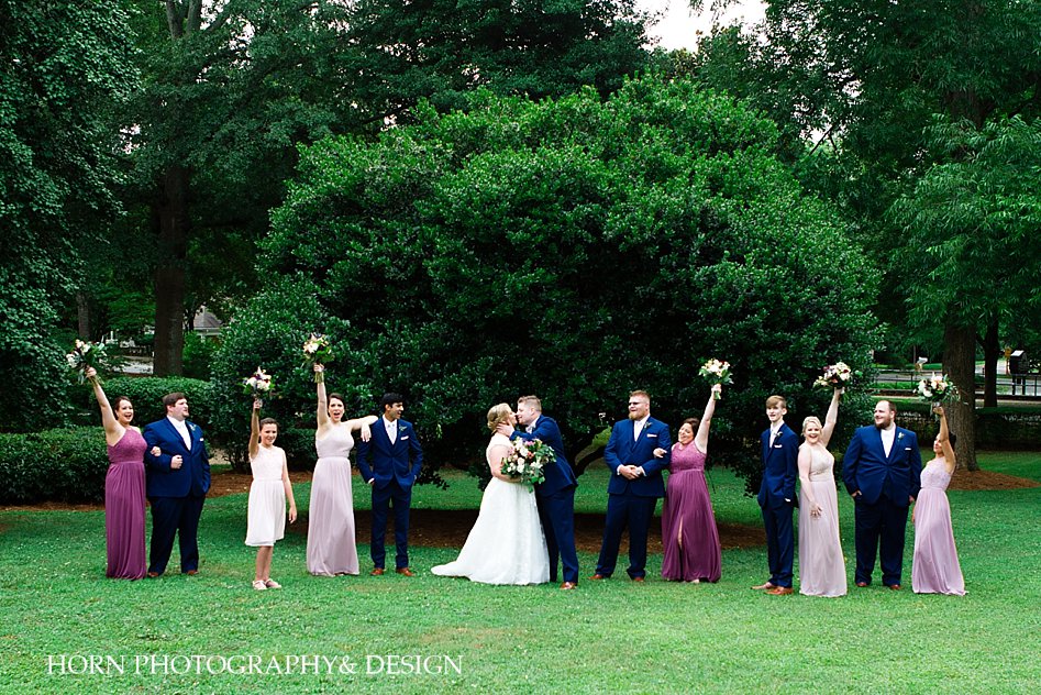 bridal party celebration bride groom kiss outdoor wedding pose ideas Atlanta Estate horn photography and design