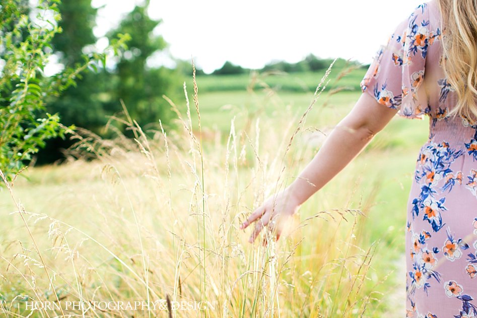 country fingers in grass photo idea scenic lilac floral dress loose hair waves Georgia horn photography and design