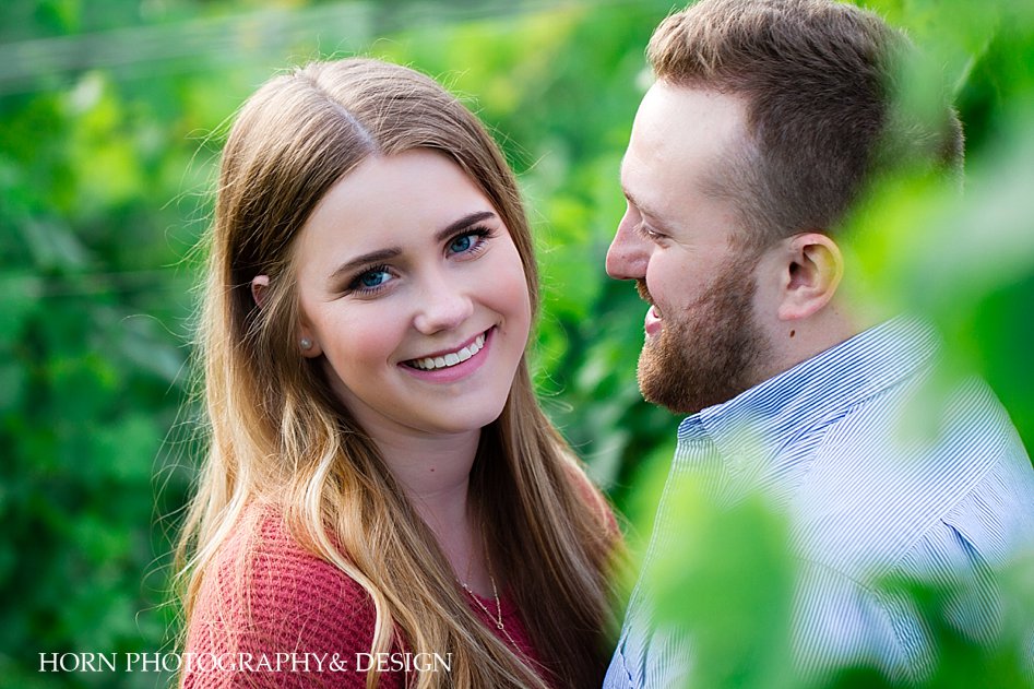 couples photo session pose ideas natural make up for photo session lasso gold chain red waffle t-shirt pin stripe oxford engagement outfit ideas horn photography and design