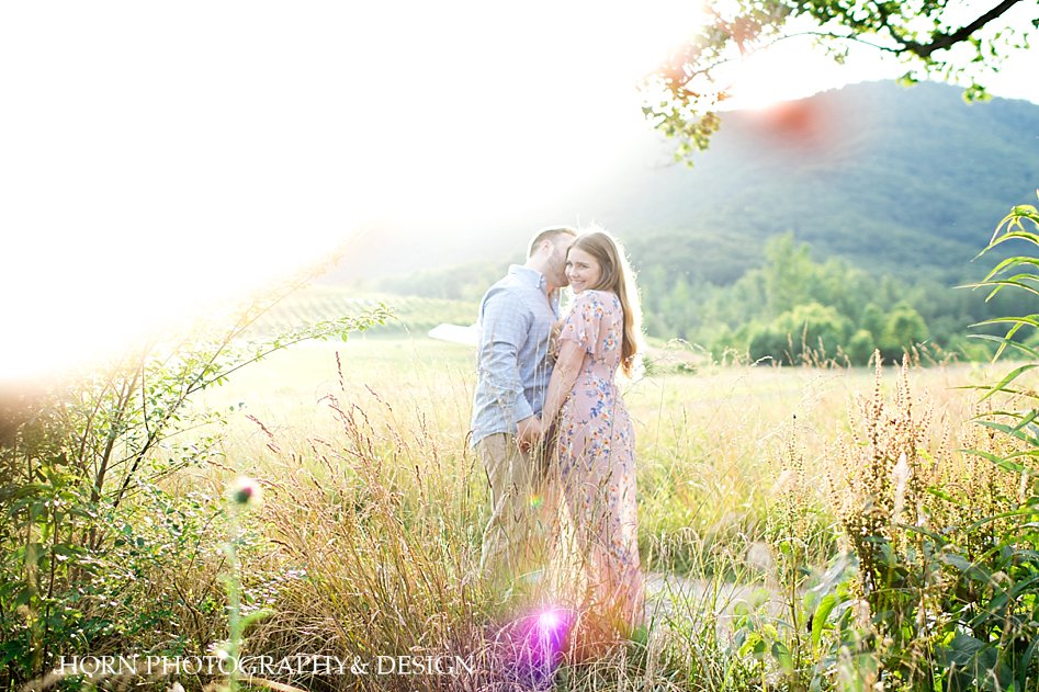 engagement love candid outdoor photo mountain setting husband and wife photography Southern Charm horn photography and design