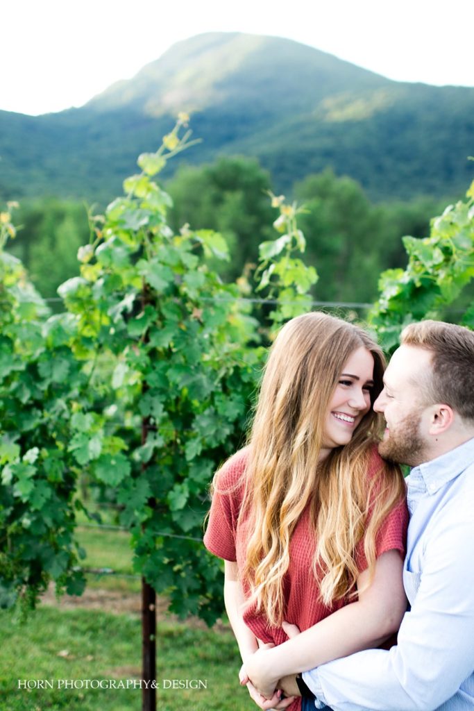 engagement photo poses vineyard red waffle print t-shirt light blue button down horn photography and design