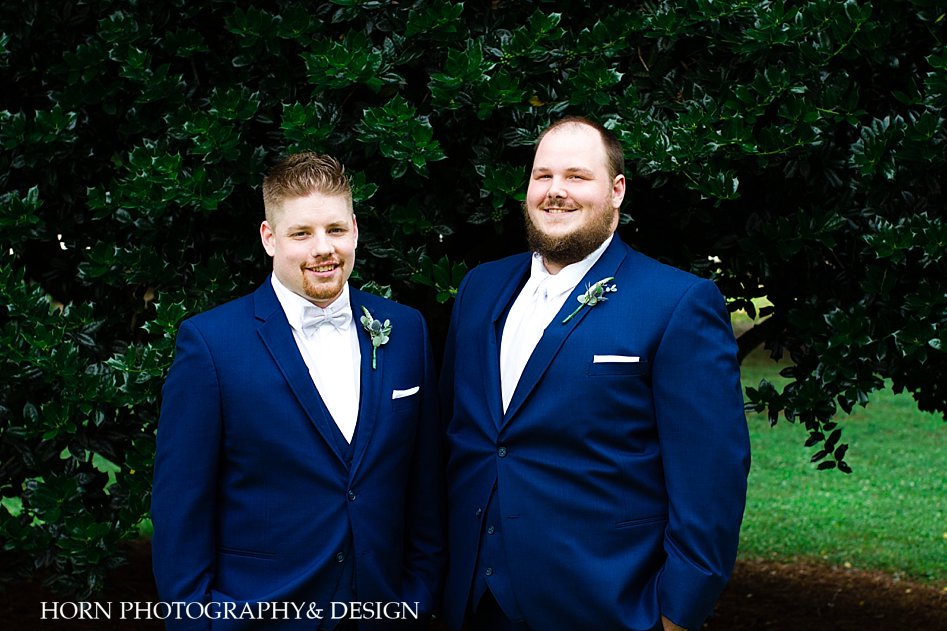 groom and best man photo pose navy tuxedo thistle boutonniere outdoor wedding Georgia horn photography and design 