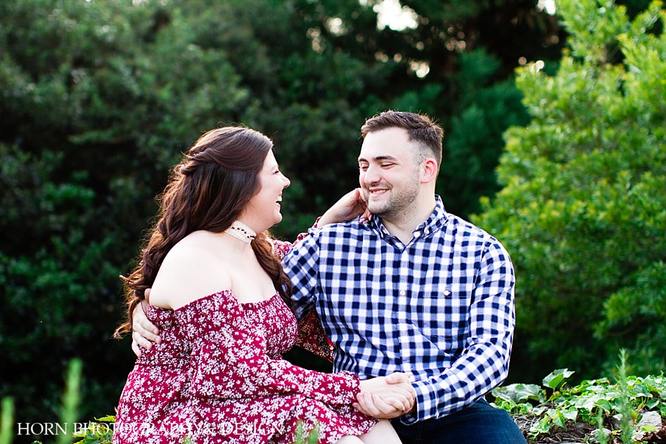 joy filled engagement photo poses off shoulder floral dress checkered button down before i do horn photography and design