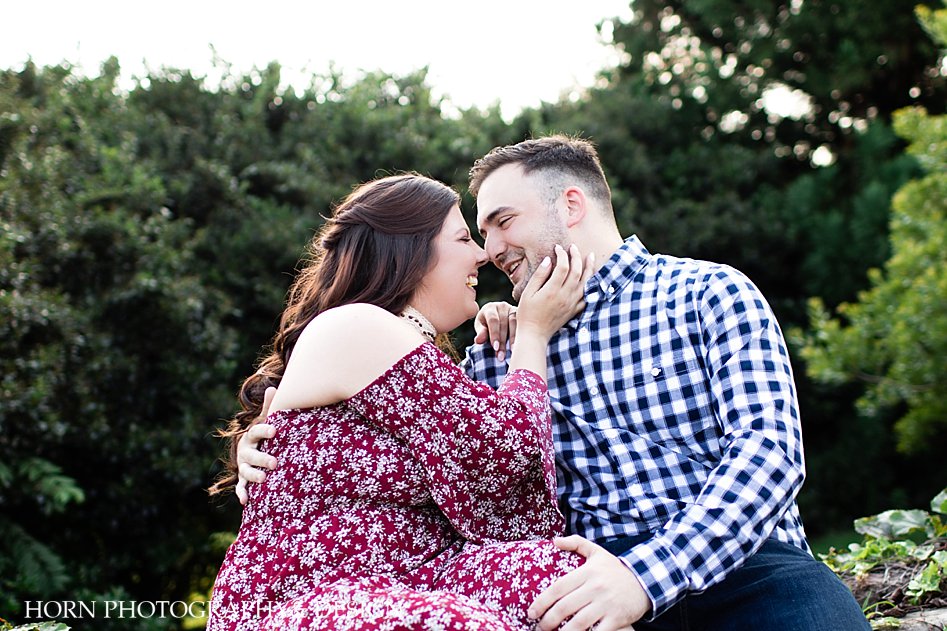 noses touching smiling engagement session poses Southern charm outfit ideas horn photography and design