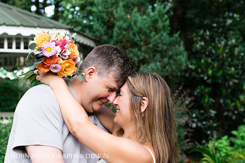 anniversary photo pose ideas peach orange roses pink gerber daisy outdoor pictures North Georgia horn photography and design
