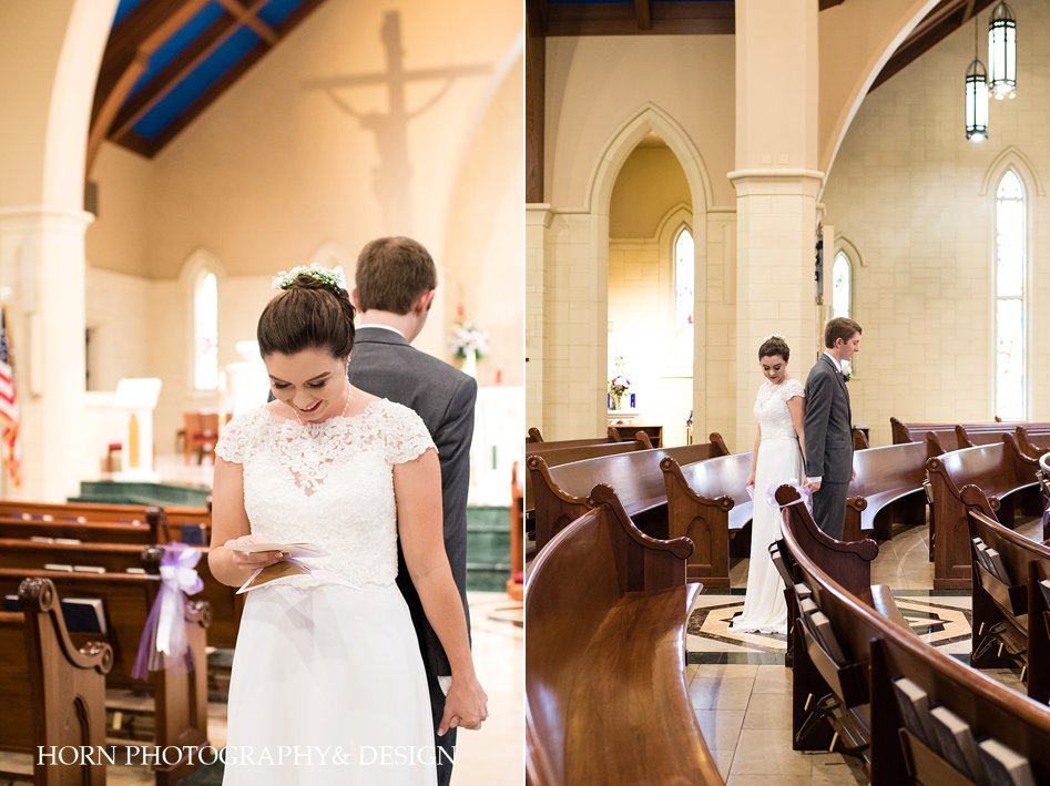 holding hands back to back before wedding inside chapel  not looking natural light horn photography and design