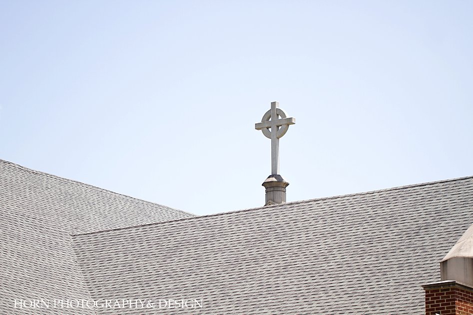 celtic cross on top of church blue skies natural light digital camera Atlanta Georgia horn photography and design