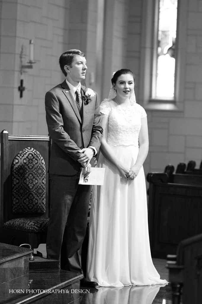 black and white bride and groom traditional wedding photograph Catholic Mass Roswell GA horn photography and design