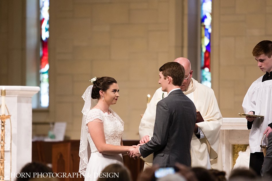 Photos to take during traditional Catholic wedding husband and wife team horn photography and design