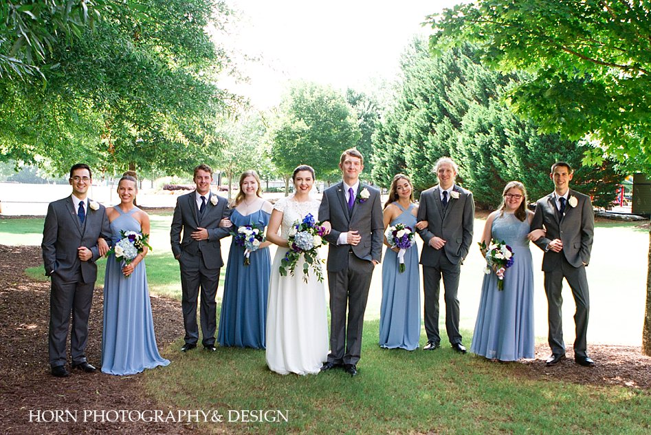 outdoor natural light bridal party bride and groom pose idea Southeast wedding horn photography and design