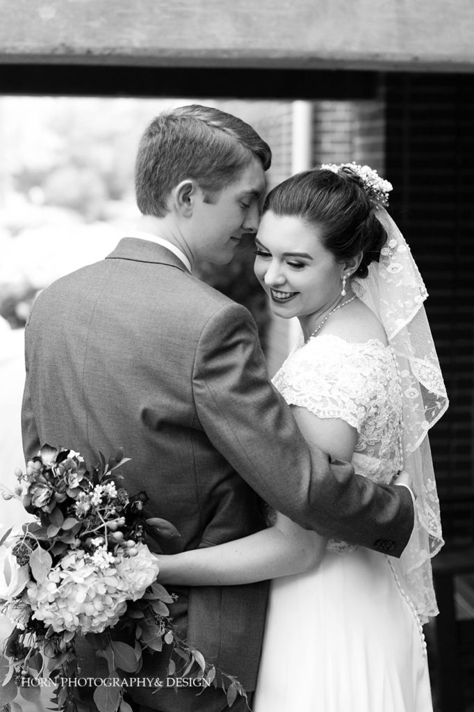 black and white traditional bride and groom intimate portrait Catholic Southern Wedding horn photography and design