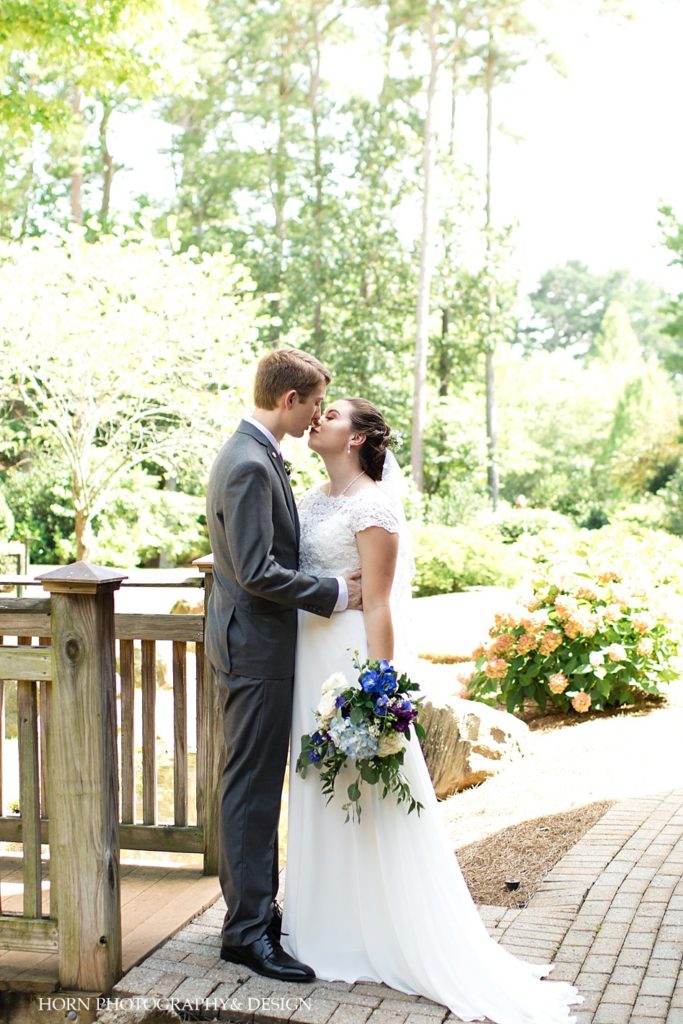 bride and groom kissing outdoor photo session wedding day Metro Atlanta horn photography and design